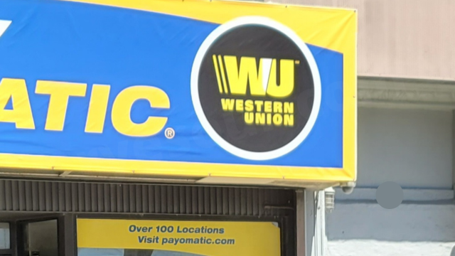 Payomatic sign with a logo of Western Union