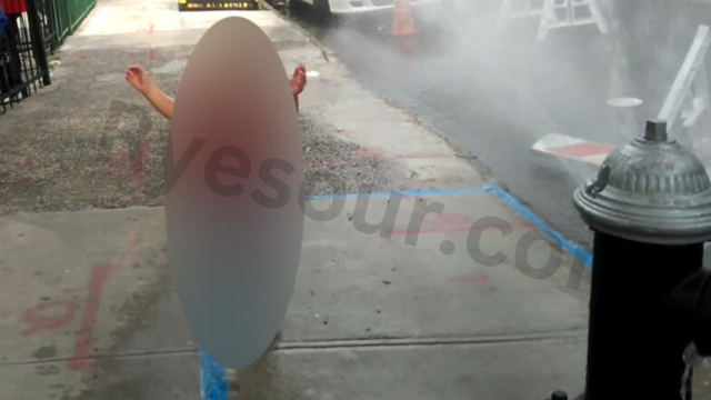 A child playing with water from a fire hydrant in nyc